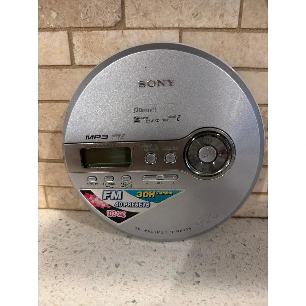 Sony D-NF340 Walkman MP3 FM CD Player 30H Stamina ID 3 Tag 40 Presets